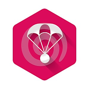 White Parachute icon isolated with long shadow background. Extreme sport. Sport equipment. Pink hexagon button. Vector