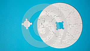 White part of jigsaw puzzle pieces on blue background. concepts of problem solving, business success, teamwork, Team playing