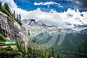 The White Pass and Yukon Route on train passing through vast lan photo