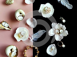 White pearl jewelry gold rings on a black background with pink opal in seashell , precious stones, rose petals and feathers concep