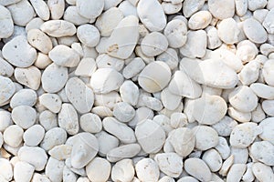 White pebble on the small zen garden ground.