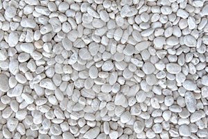 White pebble stone background texture.