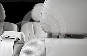 White perforated leather drivers headrest