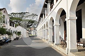 White perspective street with pavement and arcade building in Fort Galle Sri Lanka