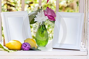 White photo frames on the table for wedding decoration