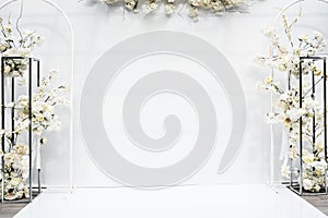 White photo zone with flowers. wedding photo arera