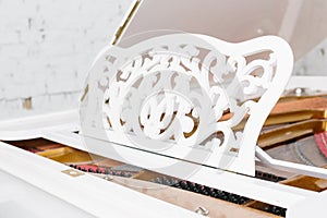 White piano details