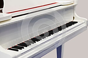 White piano. Keys. photo