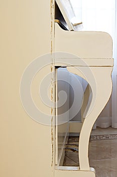 White piano, side view of instrument, musical instrument. learn photo