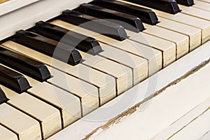 White piano, side view of instrument, musical instrument. learn photo