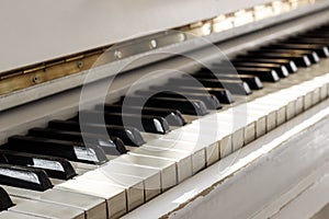 White piano, side view of instrument, musical instrument. learn photo