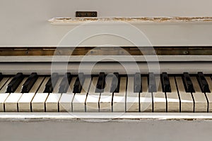 White pianoforte, front view instrument, musical instrument. lea