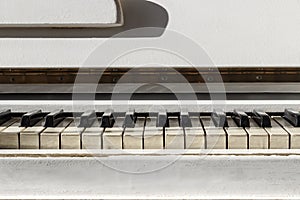 White pianoforte, front view instrument, musical instrument. lea photo