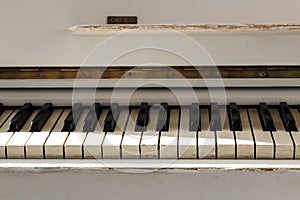 White pianoforte, front view instrument, musical instrument. lea photo