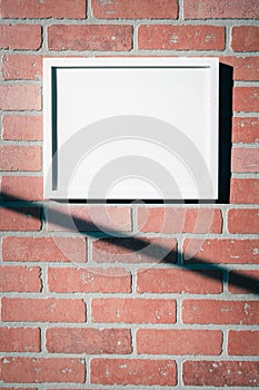 White Picture Frame on Red Brick Wall Landscape Vertical
