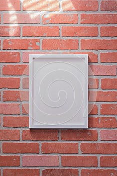 White Picture Frame on Red Brick Wall Portrait