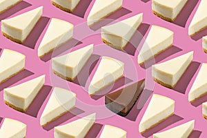 White Pieces slices cheesecake pattern with one Black chocolate piece