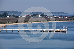 White pier in Mechelinki in Poland photo