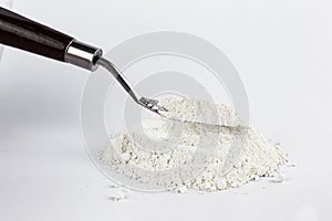 White pigment on a white background