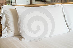 white pillow on bed