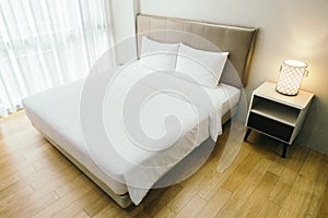 White pillow on bed