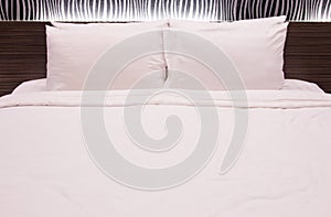 White pillow on the bed