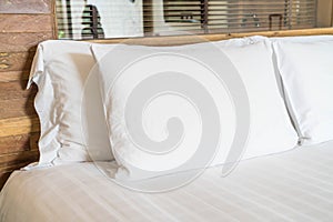 white pillow on bed