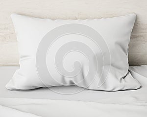 White pillow on the bed, background photo