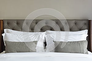 White pillows on a bed in modern room