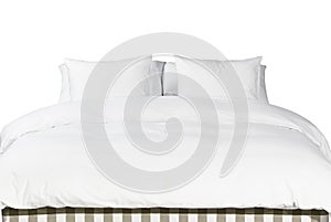 White pillows and blanket on a bed photo