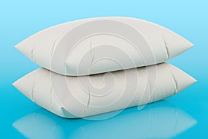 White pillows on blue background, 3D rendering