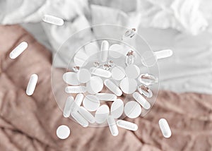 White pills. Medicines, tablets, pharmacy. Sick to be. Stay in bed. Illness, disease, health, healthcare concept