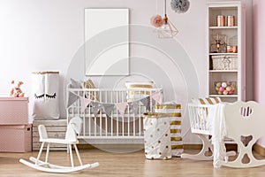 White and pink baby room