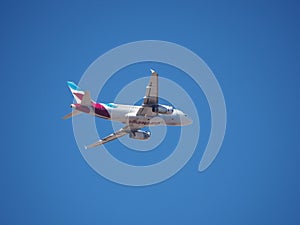 An Airbus A319 flying