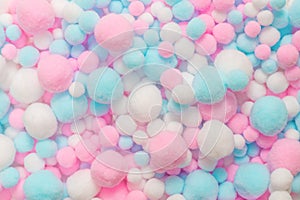 White, pink and blue soft pompons.