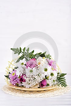 White and pink bouquet on table