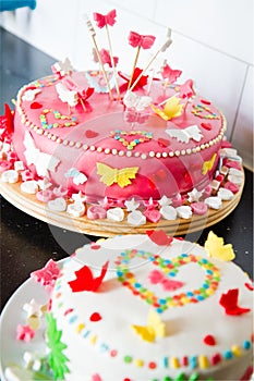 White and pink Marzipan cakes on