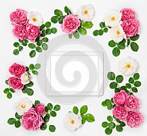 White and pink rose flowers and digital tablet pc
