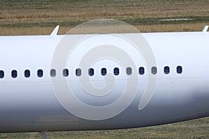 White plane, close-up view of windows