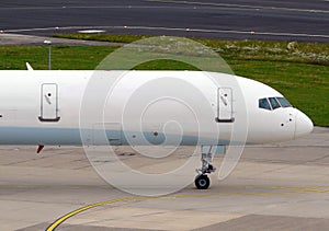 White plane taxing