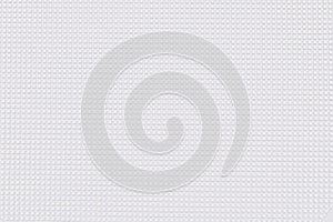 White plastic background with small square pattern