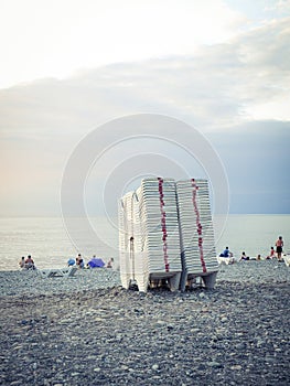 White plastic beach chairs