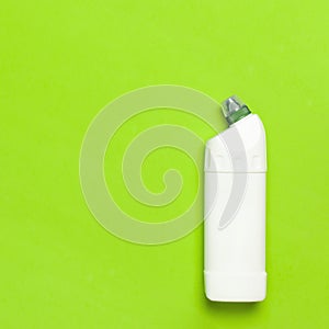 White plastic bottle for liquid detergent, cleaning agent, bleach, antibacterial gel with natural plant extract and green leaves