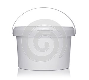 White plastic bucket with lid on a white