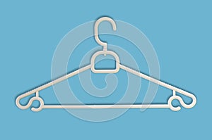 White plastic hanger on black blue kground