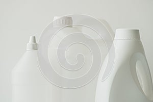 White plastic jerrycan and bottle canister for chemical liquids