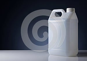 A white plastic jerrycan with a handle isolated on white background