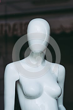 Plastic mannequin in a shop window