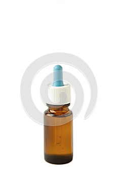 White plastic nasal spray bottle isolated on white background. Runny nose, colds