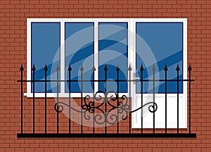 White plastic pvc window with door and balcony with black metal balcony rail, front view. isolated on a red brown brick wall
